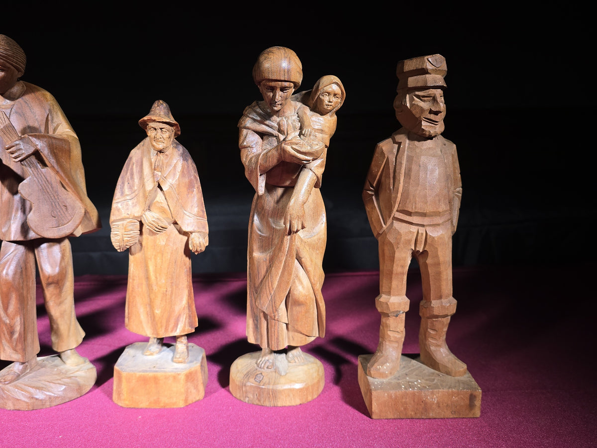 Grouping of Seven Vintage Hand-Carved Wood Figures
