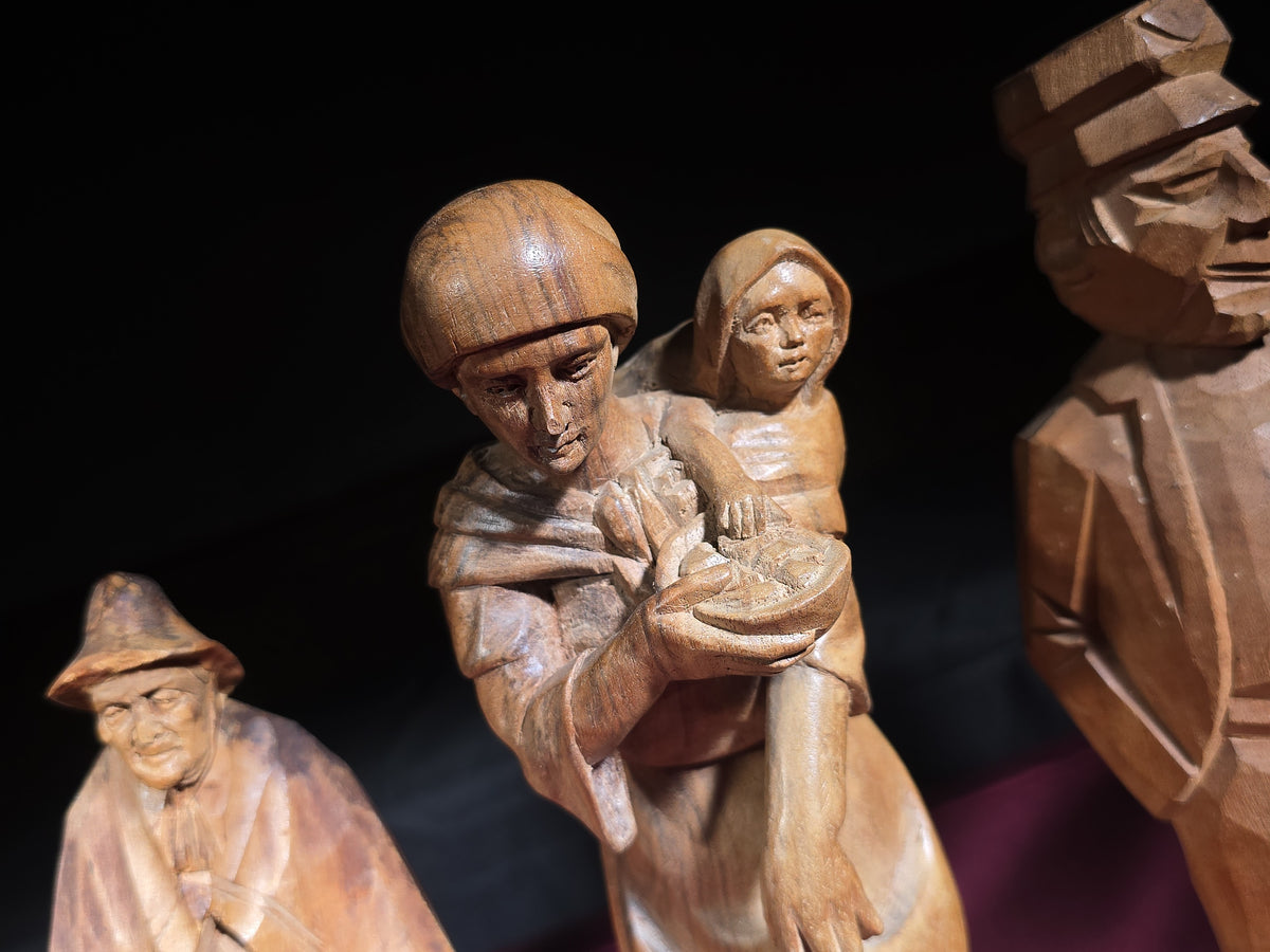 Grouping of Seven Vintage Hand-Carved Wood Figures