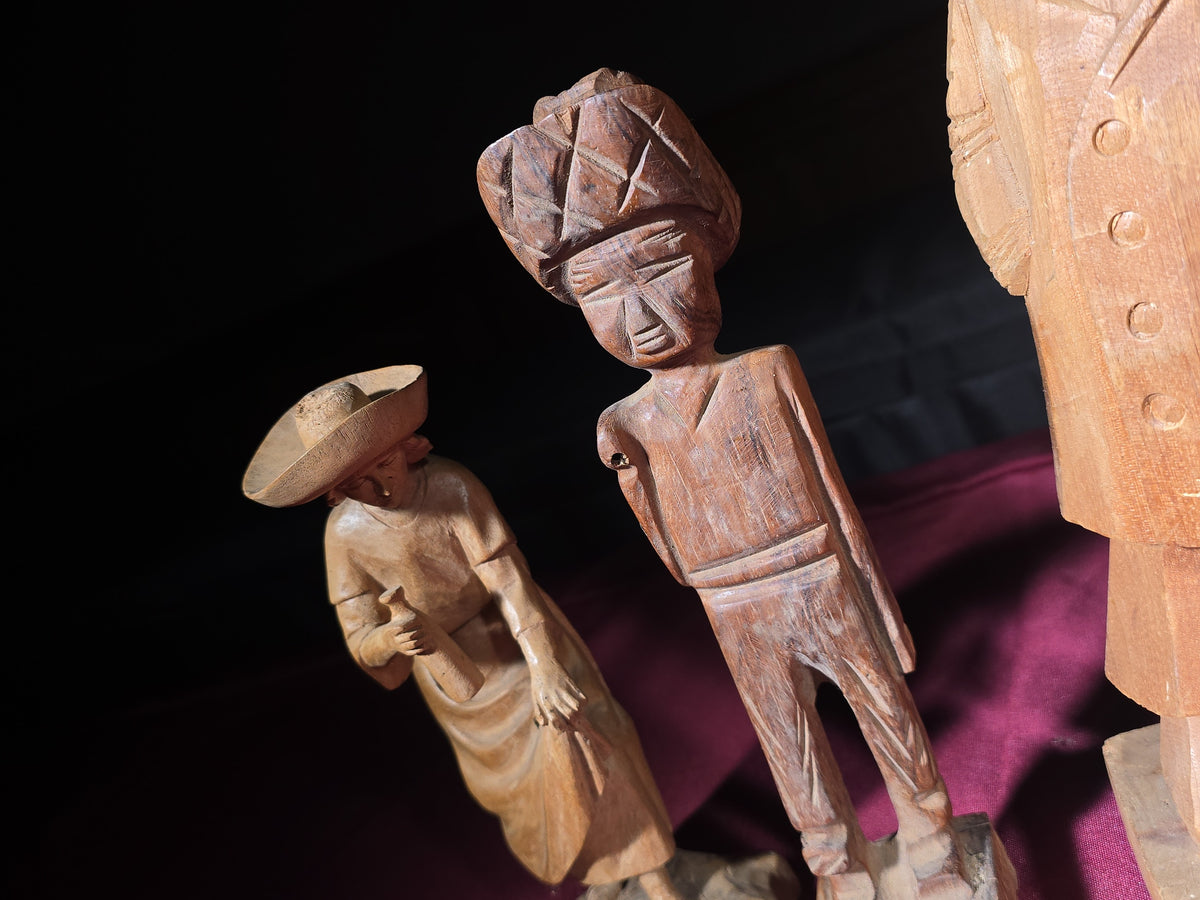 Grouping of Seven Vintage Hand-Carved Wood Figures