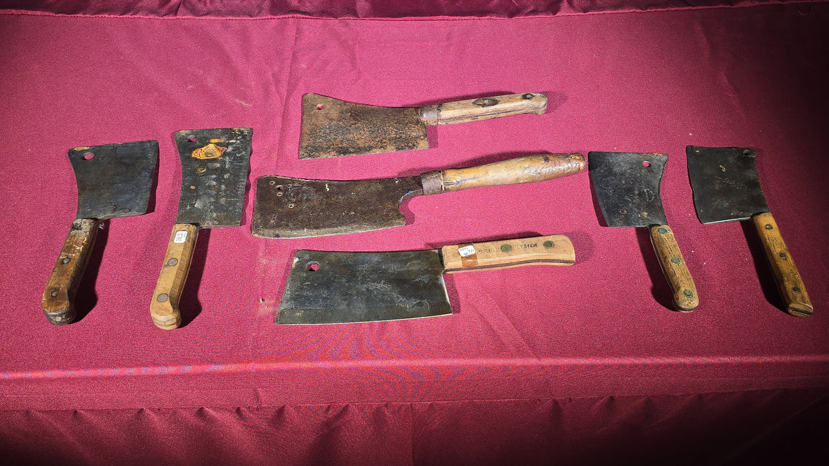 Grouping of Seven Antique and Vintage Meat Cleavers including Foster Bros., Dexter, Nichols Bros., and Russell