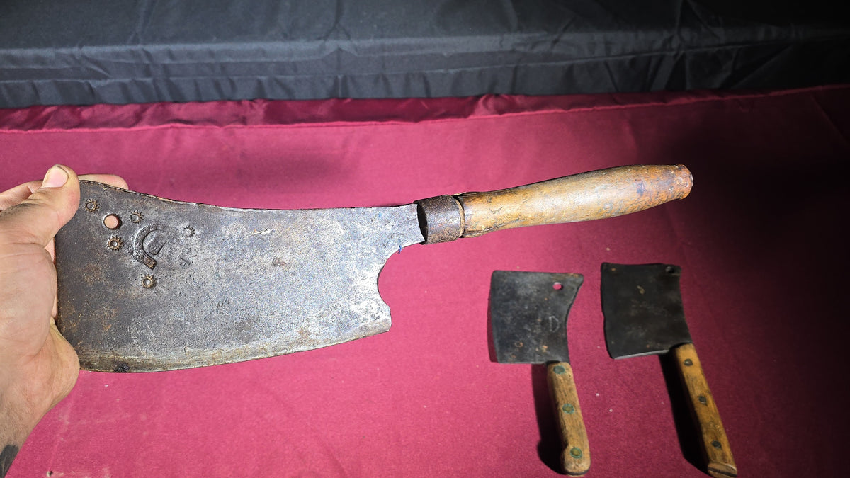 Grouping of Seven Antique and Vintage Meat Cleavers including Foster Bros., Dexter, Nichols Bros., and Russell