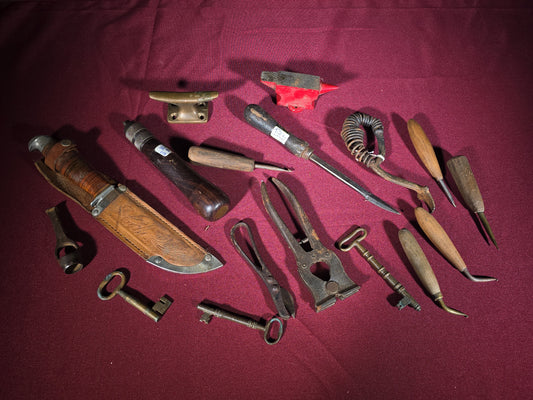 Grouping of Antique and Vintage Small Hand Tools and Hardware including Hunting Knife with Leather Sheath, Miniature Anvil, Dock Cleat, Skeleton Keys, and Awls