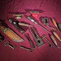 Lot 057 - Grouping of Antique and Vintage Small Hand Tools and Hardware Including Hunting Knife with Leather Sheath, Miniature Anvil, Dock Cleat, Skeleton Keys, and Awls