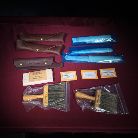 Grouping of Modern Brand New Lie-Nielsen Toolworks Tools including Latta Inlay Radius Cutter with Blades, Side Float Pull, Small Cheek Pull, Large Cheek Pull, Two Brushes, and Three Leather Cases