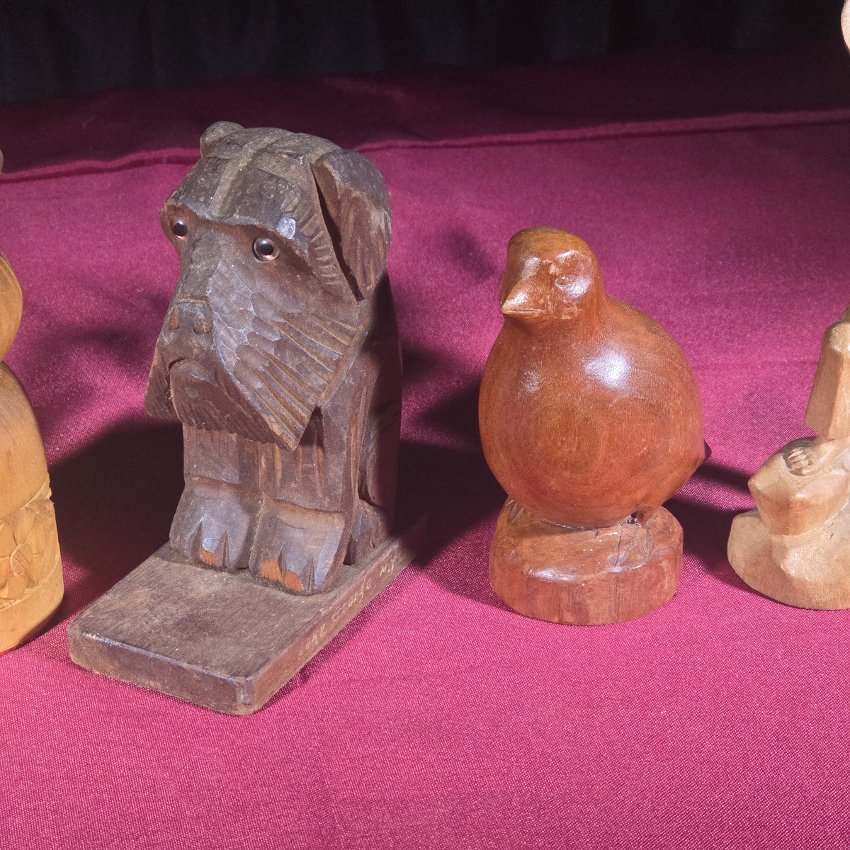 Grouping of Five Vintage Hand-Carved Wood Figures including a Guitar Player, Dog, Bird, and Figural Bust
