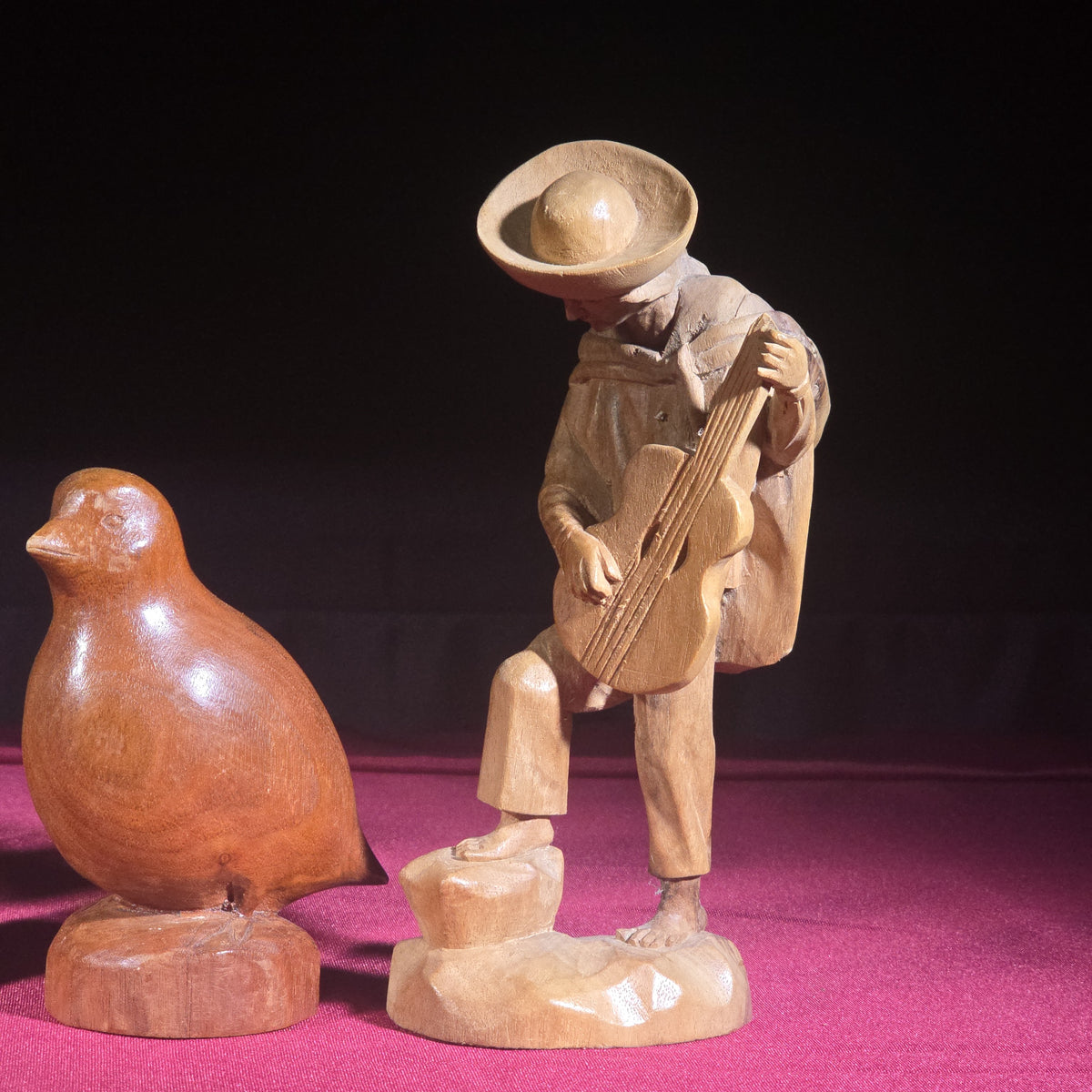 Grouping of Five Vintage Hand-Carved Wood Figures including a Guitar Player, Dog, Bird, and Figural Bust