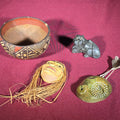 Lot 104 - Grouping of Four Vintage and Antique Decorative Objects Including Painted Pottery Bowl, Carved Stone Animal Figure, and Two Carved Masks