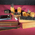 Lot 058 - Grouping of Vintage and Antique Machinist Tools Including Steel Letter and Number Stamp Sets, Pin Punches, Shrink Rule, and Precision Square
