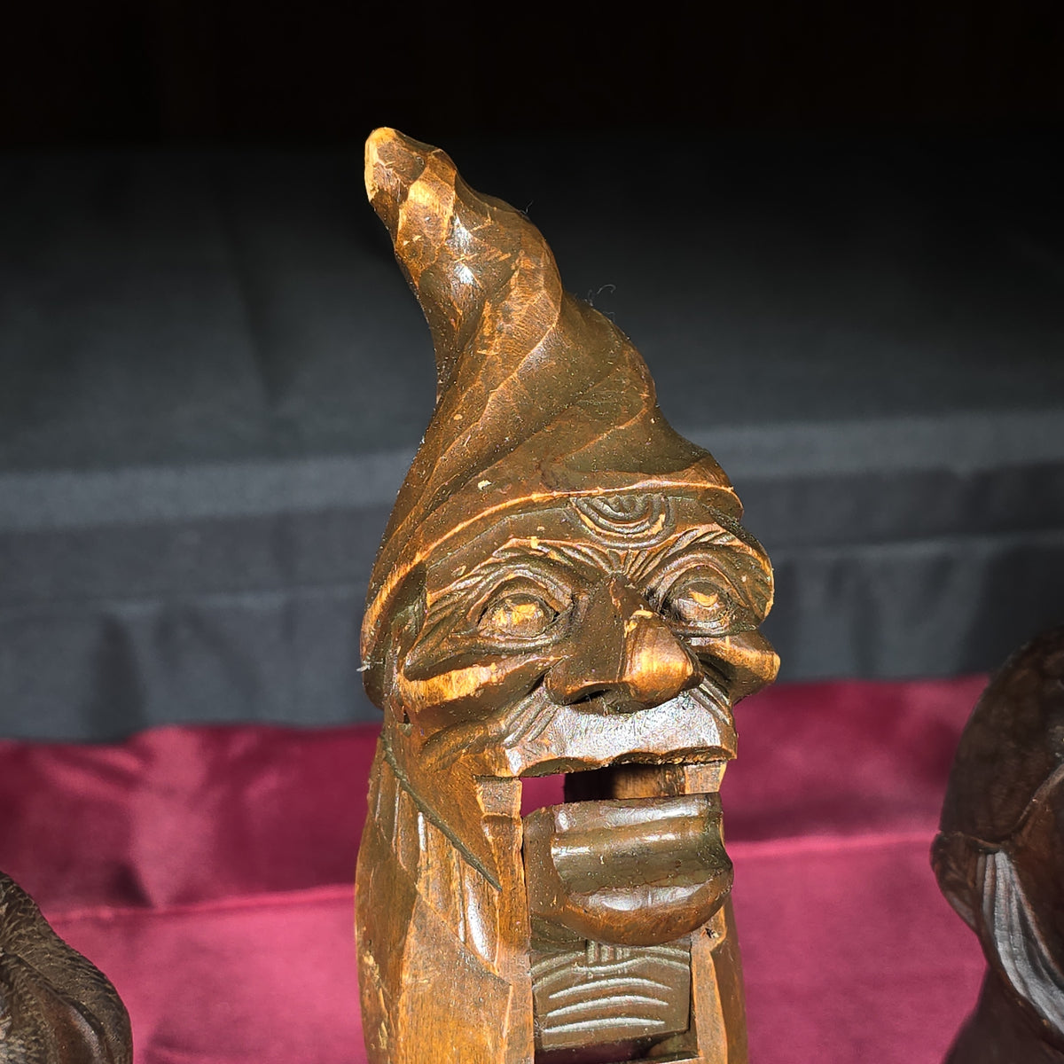 Grouping of Five Antique Carved Wood Items including Four Figural Nutcrackers and an Acorn-Form Cup