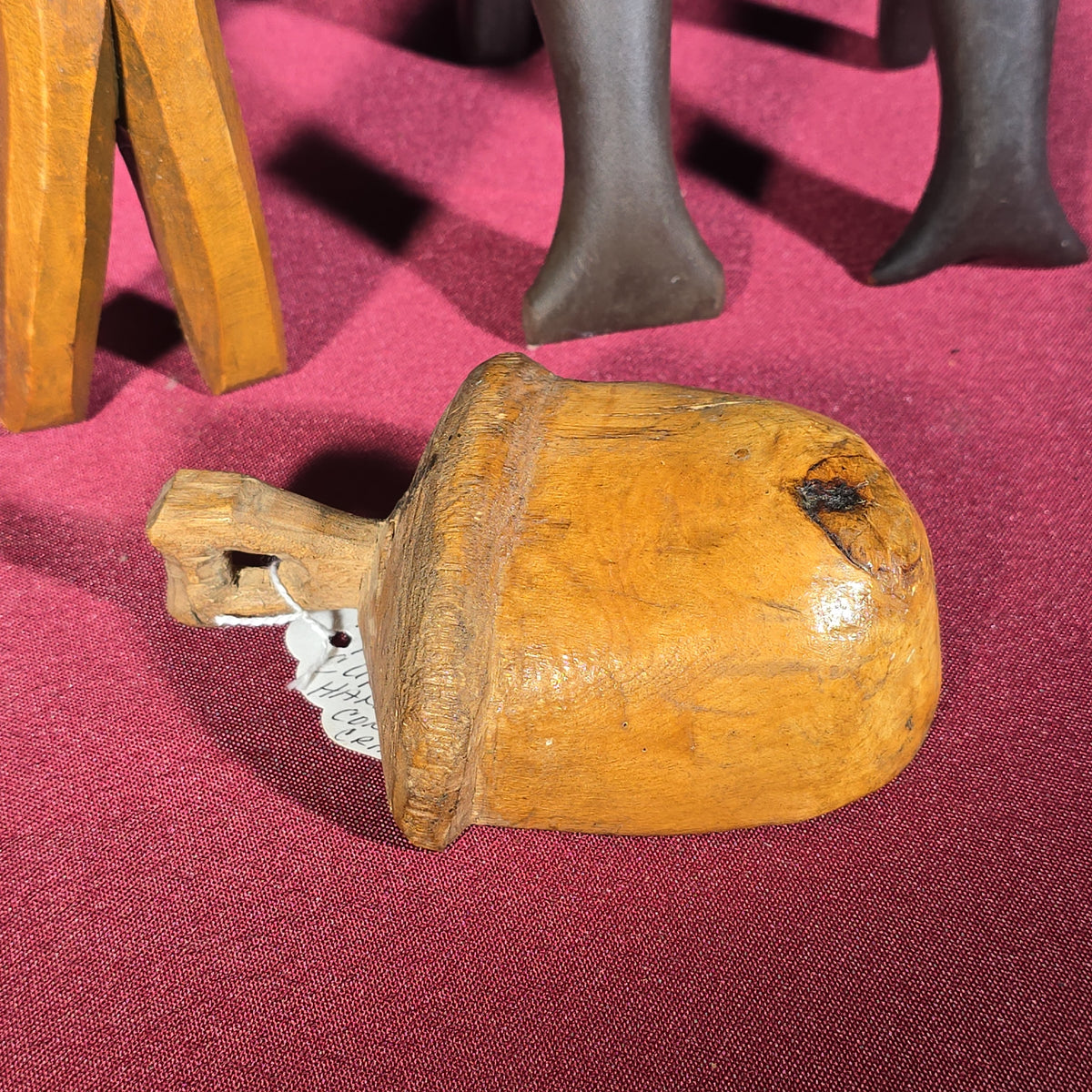 Grouping of Five Antique Carved Wood Items including Four Figural Nutcrackers and an Acorn-Form Cup