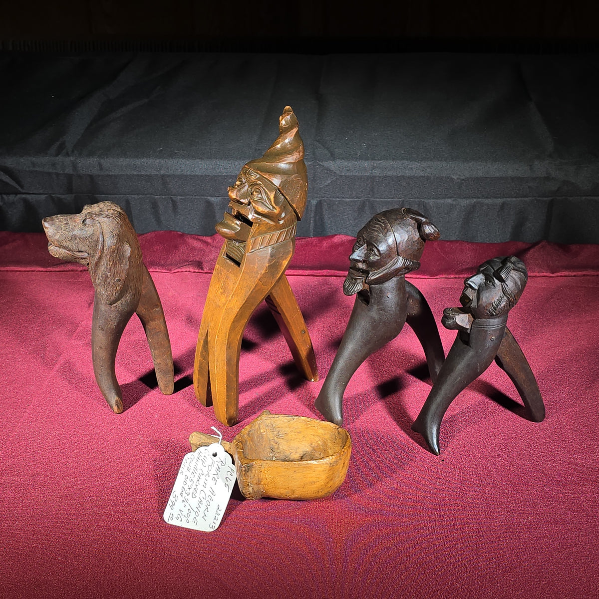 Grouping of Five Antique Carved Wood Items including Four Figural Nutcrackers and an Acorn-Form Cup