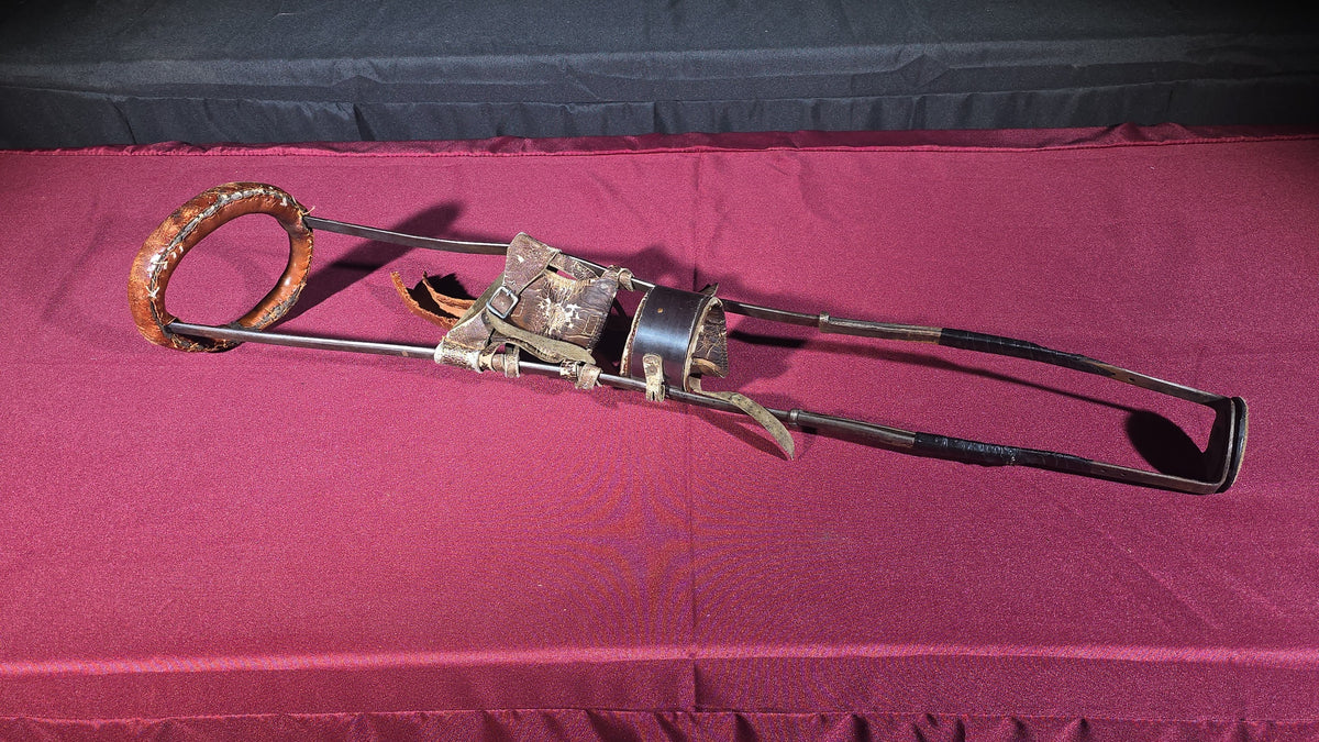 Antique Metal Frame Prosthetic Leg with Leather Straps and Padding