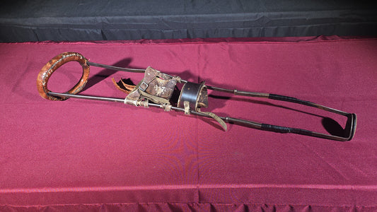 Antique Metal Frame Prosthetic Leg with Leather Straps and Padding
