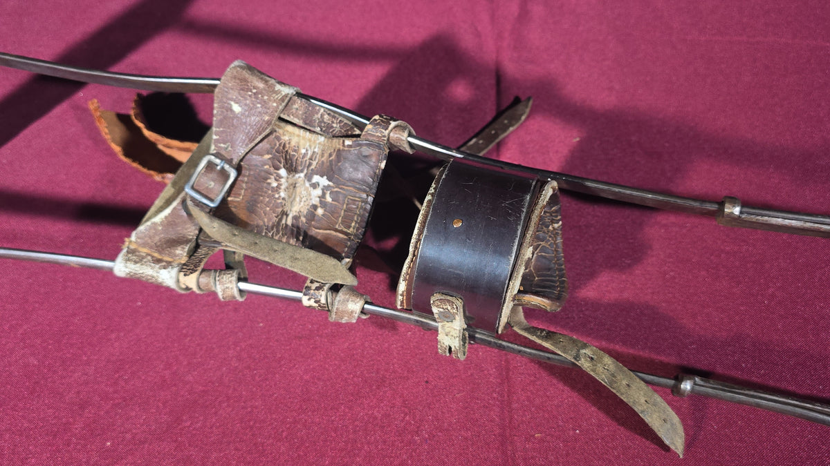 Antique Metal Frame Prosthetic Leg with Leather Straps and Padding