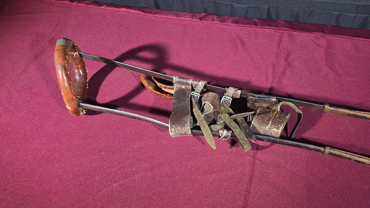 Antique Metal Frame Prosthetic Leg with Leather Straps and Padding