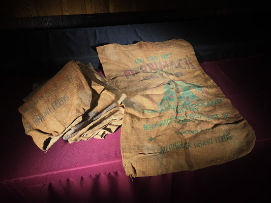 Grouping of Seven Vintage Merrimack Brand Feeds Burlap Feed Sacks, Manufactured by Merrimack Farmers Exchange Inc., Concord, New Hampshire