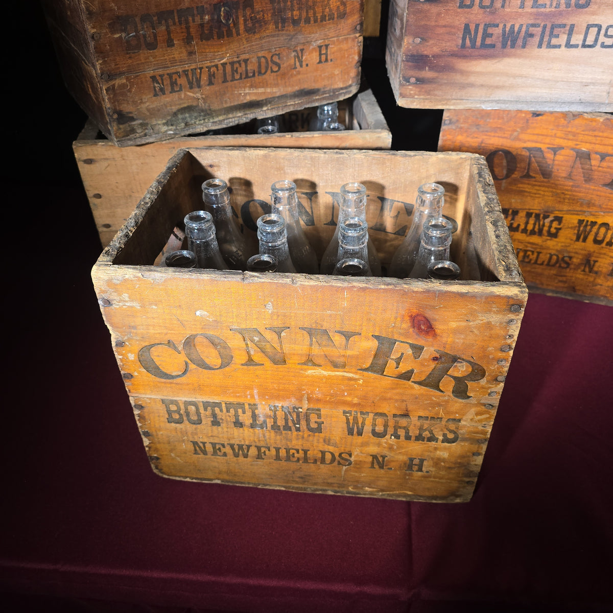 Grouping of Five Vintage Conner Bottling Works Wooden Beverage Crates with Glass Bottles, Newfields, New Hampshire