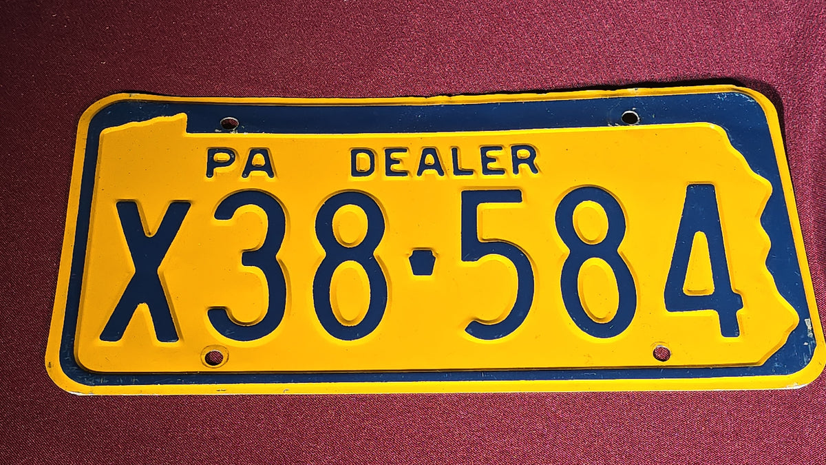 Grouping of Seven Vintage Pennsylvania License Plates including Bicentennial and Dealer Plates, 1970s–1980s