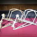 Lot 228 - Pair of Antique White-Painted Cast Iron Fire Hose Brackets, Manufactured by B.C. Co., Dated 1912, 25" L each