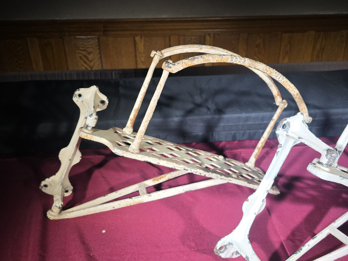 Pair of Antique White-Painted Cast Iron Fire Hose Brackets, Manufactured by B.C. Co., Dated 1912