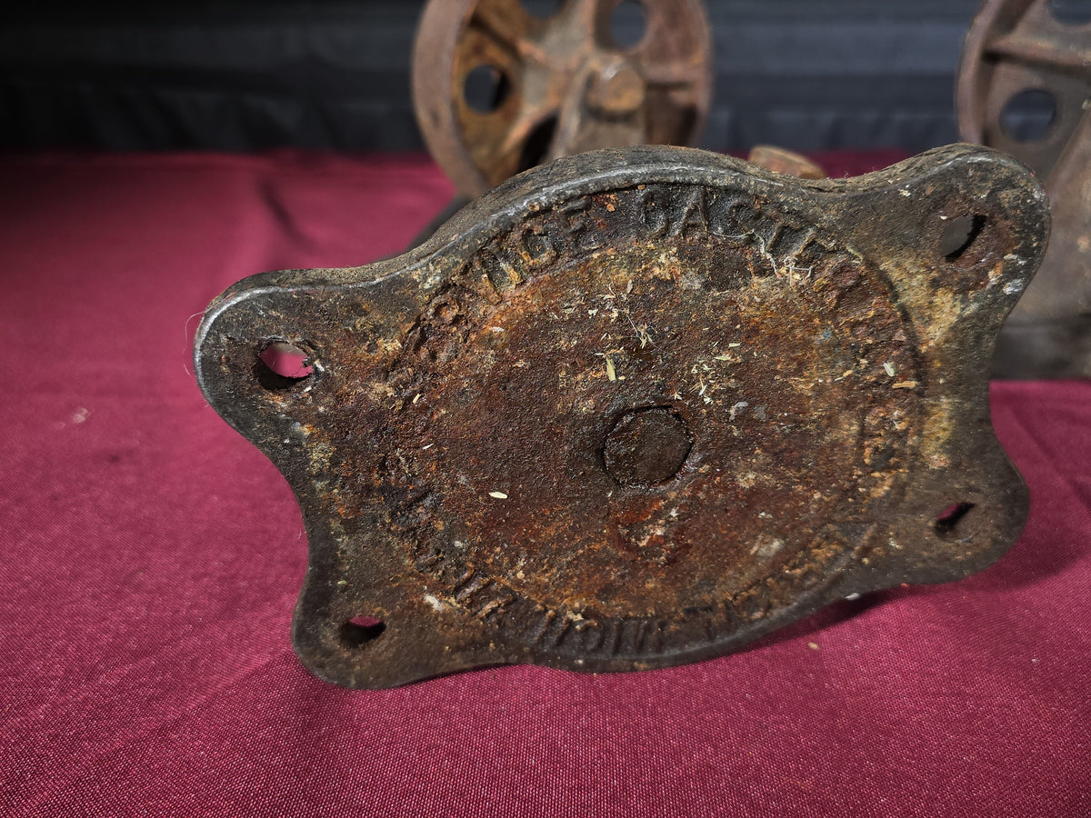 Grouping of Four Antique Cast Iron Industrial Caster Wheels, Manufactured by Service Caster Co., Albion, Michigan