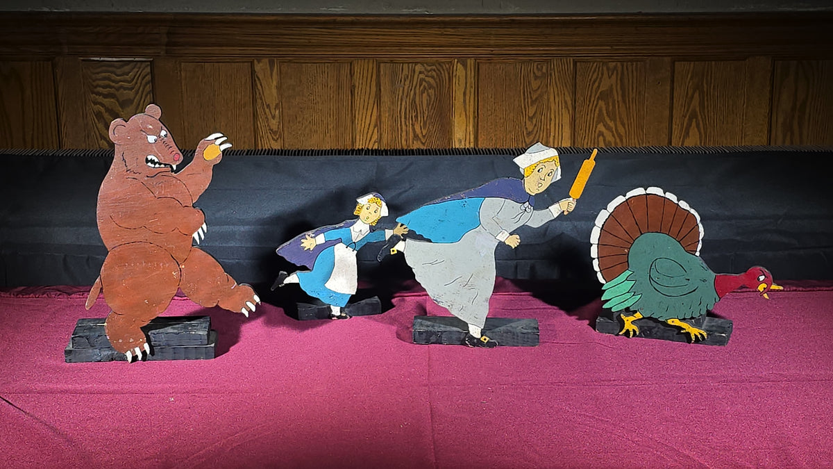 Grouping of Four Vintage Folk Art Hand-Painted Wooden Cutout Figures including Bear, Turkey, and Two Pilgrim Women