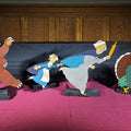 Lot 286 - Grouping of Four Vintage Folk Art Hand-Painted Wooden Cutout Figures Including Bear, Turkey, and Two Pilgrim Women