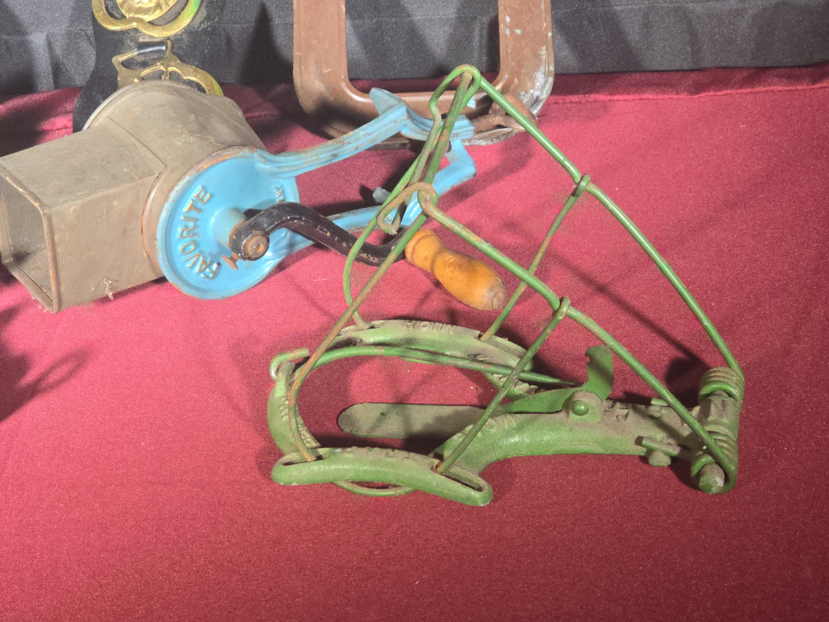 Grouping of Antique and Vintage Country Smalls including Meat Grinder, Horse Brass Strap, Favorite Apple Peeler, and Copper Water Sprinklers