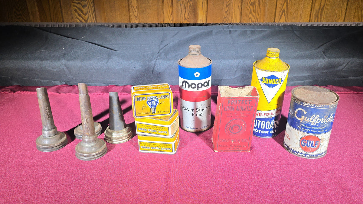 Grouping of 11 Antique and Vintage Automotive Advertising Cans and Accessories including Gulfpride, Sunoco, Mopar, Edison Mazda Lamps, and Master Oil Spouts