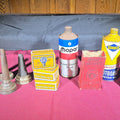 Lot 097 - Grouping of 11 Antique and Vintage Automotive Advertising Cans and Accessories Including Gulfpride, Sunoco, Mopar, Edison Mazda Lamps, and Master Oil Spouts