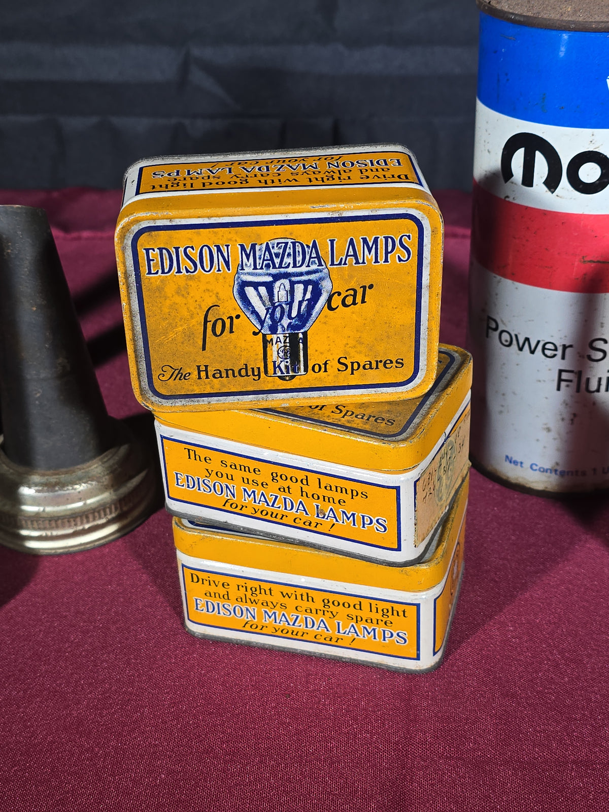 Grouping of 11 Antique and Vintage Automotive Advertising Cans and Accessories including Gulfpride, Sunoco, Mopar, Edison Mazda Lamps, and Master Oil Spouts