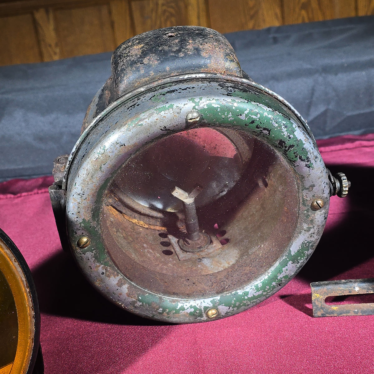 Grouping of Three Antique and Vintage Automotive Lights including Amber "STOP" Lamp, Headlamp, and Red Tail Light with License Plate Bracket