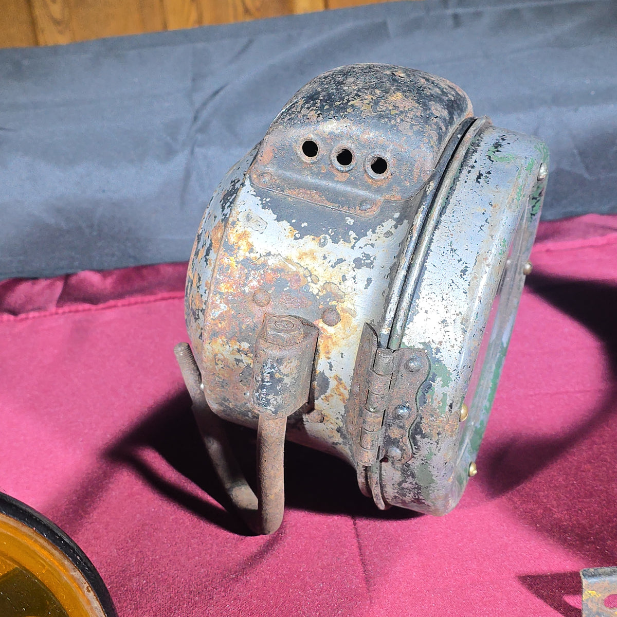 Grouping of Three Antique and Vintage Automotive Lights including Amber "STOP" Lamp, Headlamp, and Red Tail Light with License Plate Bracket