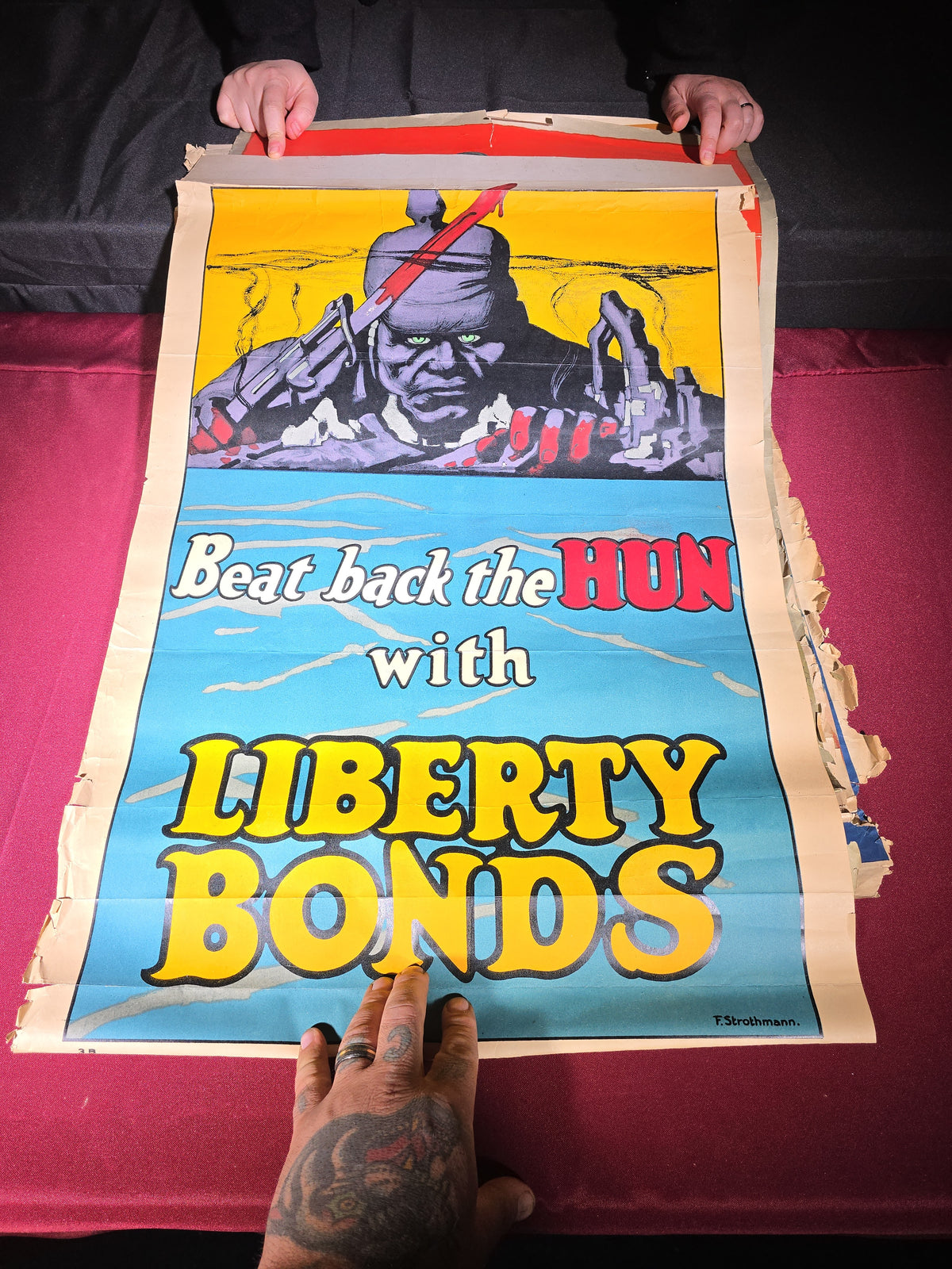 Grouping of Seven Antique WWI Propaganda and Liberty Bond Posters including "Beat Back the Hun," "Clear-The-Way!!," "Keep Him Free," and "Remember Belgium"