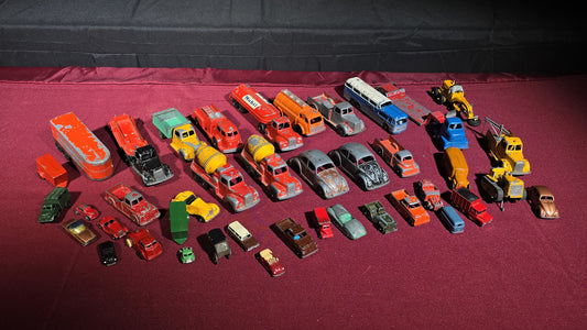 Grouping of Vintage Tootsietoy Die-Cast Vehicles including Cars, Trucks, Tankers, Construction Equipment, and a Greyhound Bus