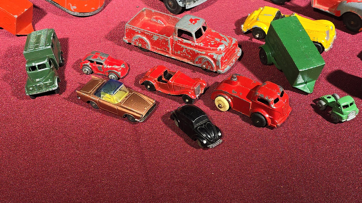 Grouping of Vintage Tootsietoy Die-Cast Vehicles including Cars, Trucks, Tankers, Construction Equipment, and a Greyhound Bus