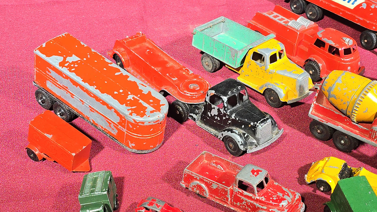 Grouping of Vintage Tootsietoy Die-Cast Vehicles including Cars, Trucks, Tankers, Construction Equipment, and a Greyhound Bus