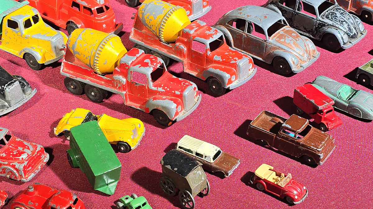 Grouping of Vintage Tootsietoy Die-Cast Vehicles including Cars, Trucks, Tankers, Construction Equipment, and a Greyhound Bus