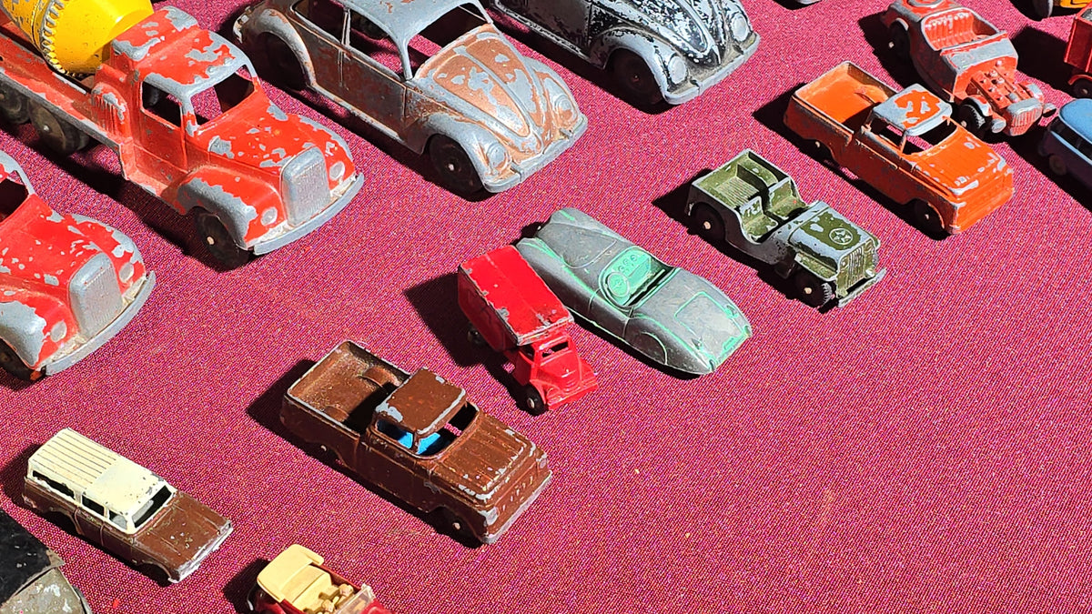 Grouping of Vintage Tootsietoy Die-Cast Vehicles including Cars, Trucks, Tankers, Construction Equipment, and a Greyhound Bus
