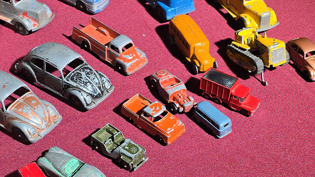 Grouping of Vintage Tootsietoy Die-Cast Vehicles including Cars, Trucks, Tankers, Construction Equipment, and a Greyhound Bus