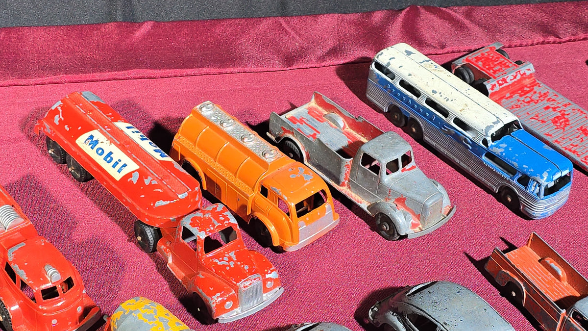Grouping of Vintage Tootsietoy Die-Cast Vehicles including Cars, Trucks, Tankers, Construction Equipment, and a Greyhound Bus