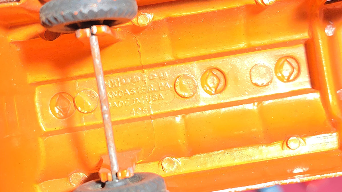 Grouping of Vintage Tootsietoy Die-Cast Vehicles including Cars, Trucks, Tankers, Construction Equipment, and a Greyhound Bus