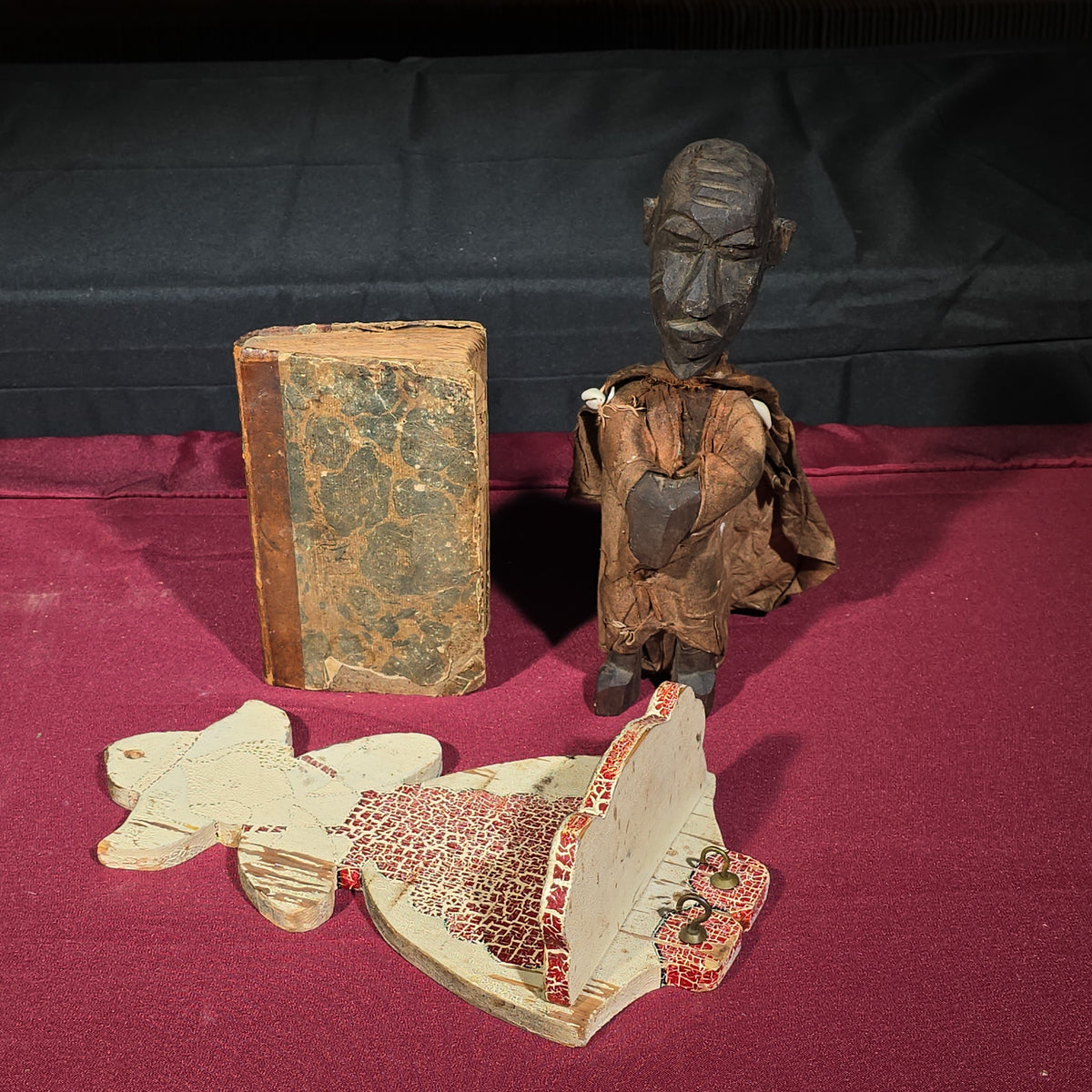 Trio of Antique and Vintage Items including Carved African Figure, Folk Art Painted Wooden Key Shelf, and 1820 "History of the United States of America" Book