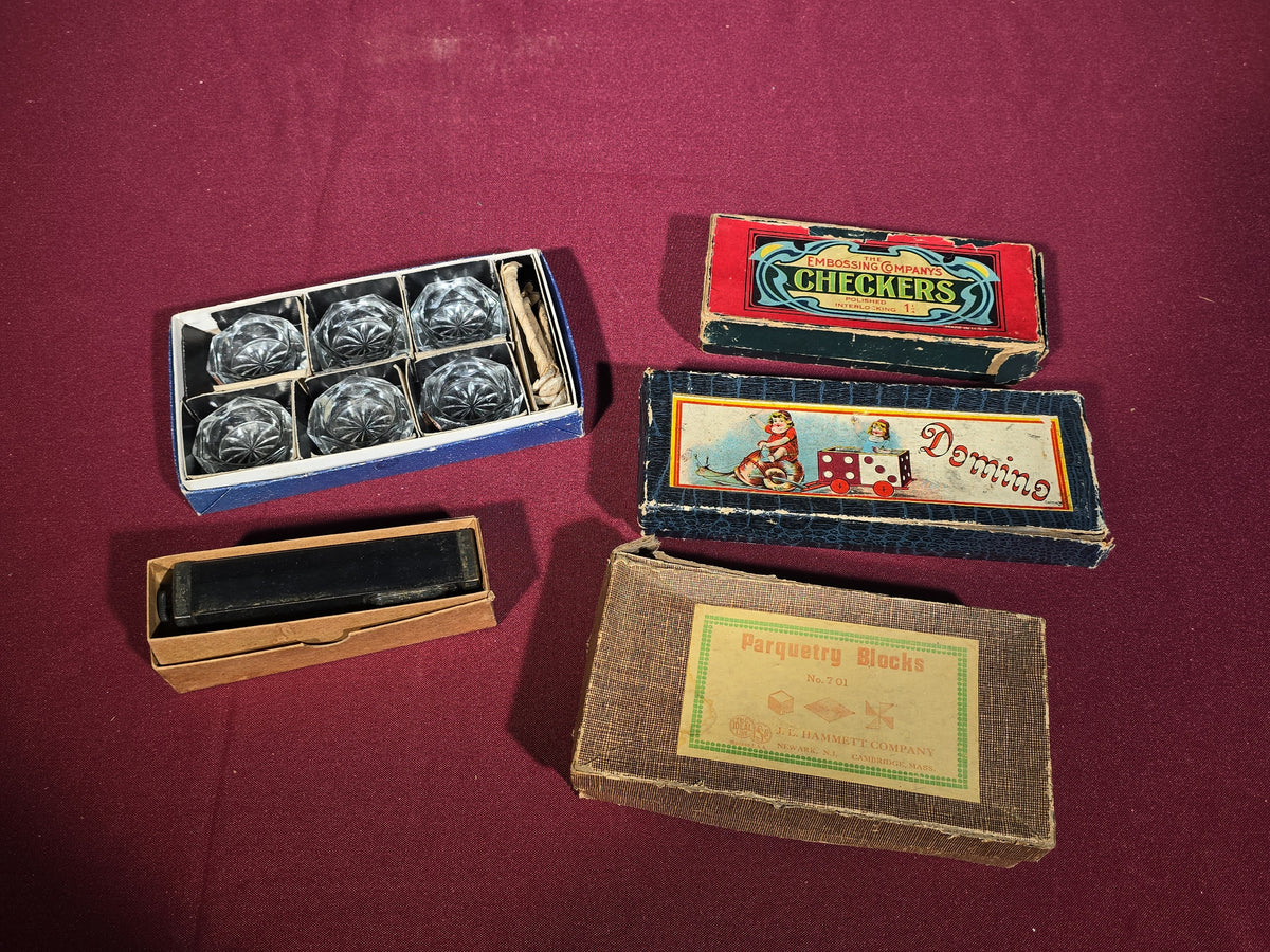 Grouping of Five Antique and Vintage Boxed Items including Embossing Company Checkers, German Domino Set, J. L. Hammett Parquetry Blocks, Glass Salt Cellars, and Pocket Level
