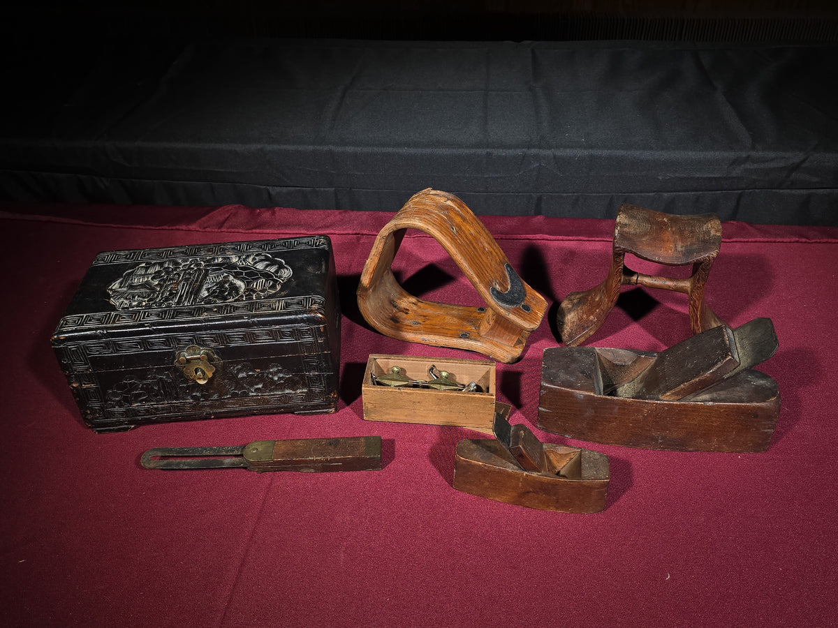 Grouping of Antique and Vintage Wooden Items including Carved Box, Wood Planes, Stirrups, and Brass Balance Scale