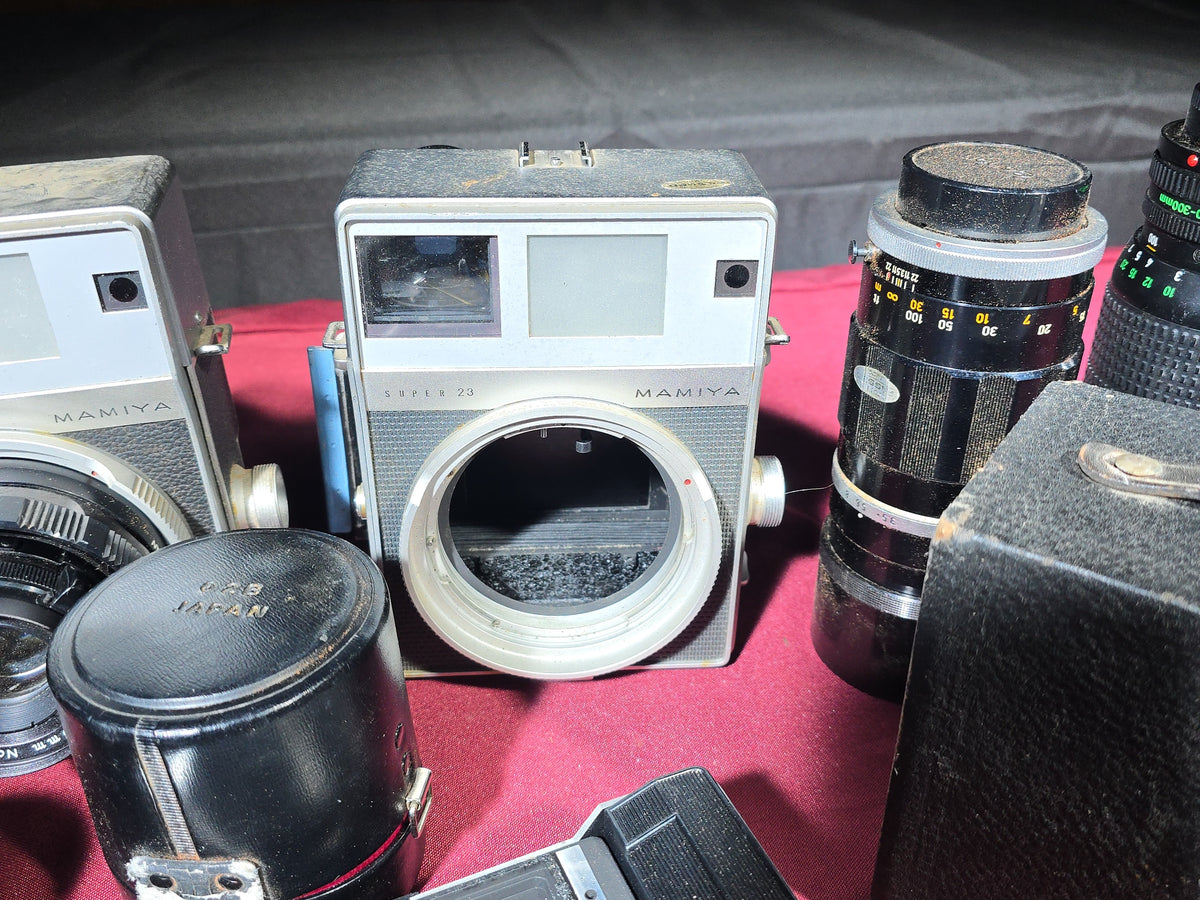 Grouping of Vintage and Antique Cameras, Lenses, and Accessories including Mamiya Universal, Mamiya Super 23, and Keystone Capri