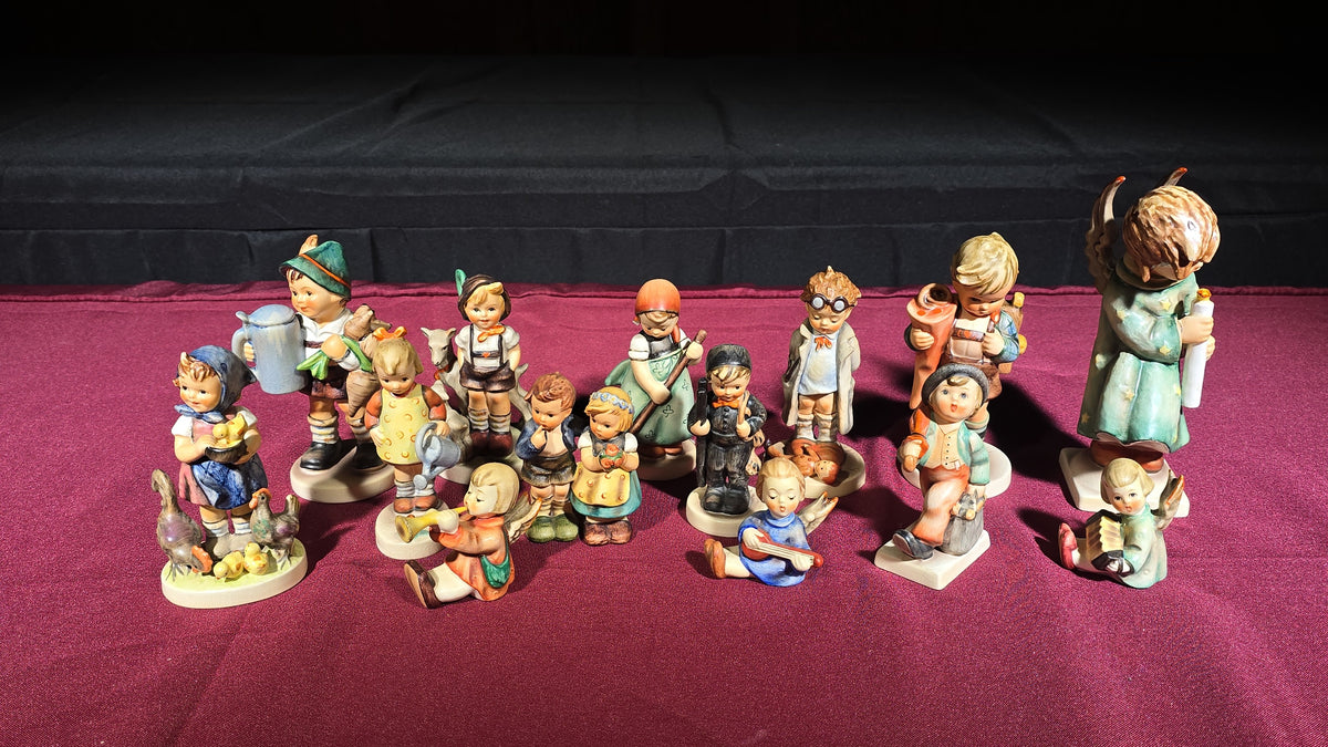 Grouping of 14 Vintage Goebel Hummel Figurines, Note Chip to Merry Wanderer and Other Various Chips and Wear