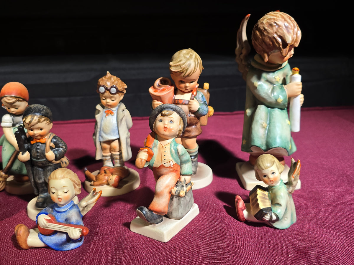 Grouping of 14 Vintage Goebel Hummel Figurines, Note Chip to Merry Wanderer and Other Various Chips and Wear