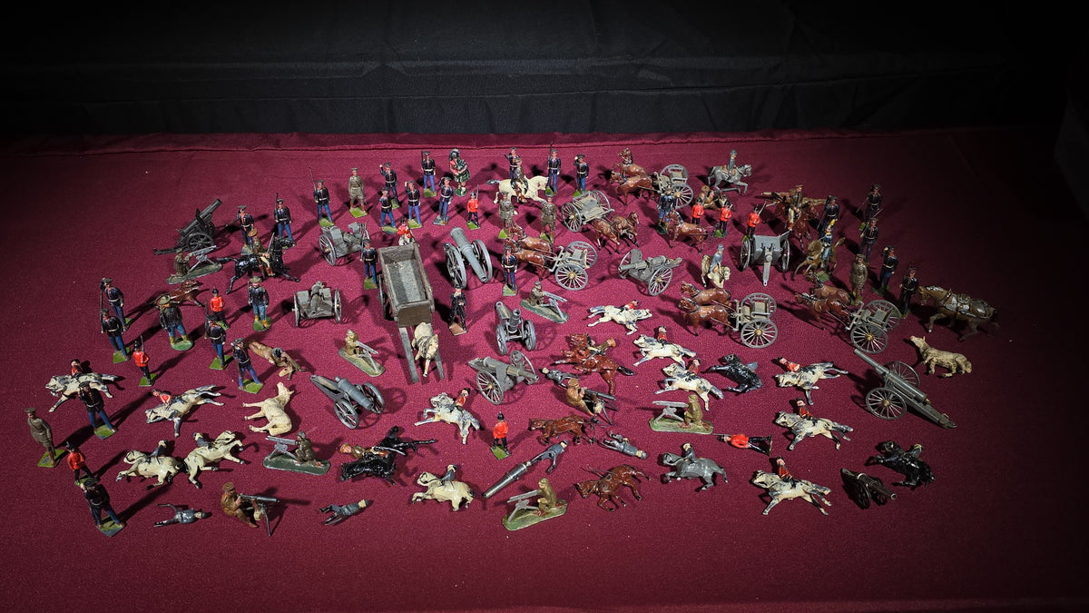 Large Grouping of Antique and Vintage Lead Toy Soldiers, Horses, Cannons, and Artillery including British and French Military Figures
