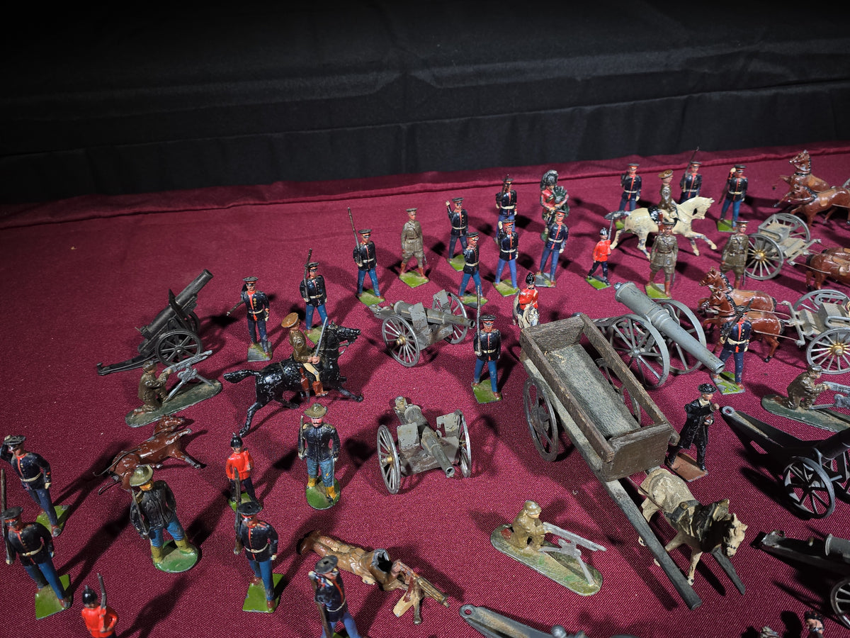Large Grouping of Antique and Vintage Lead Toy Soldiers, Horses, Cannons, and Artillery including British and French Military Figures